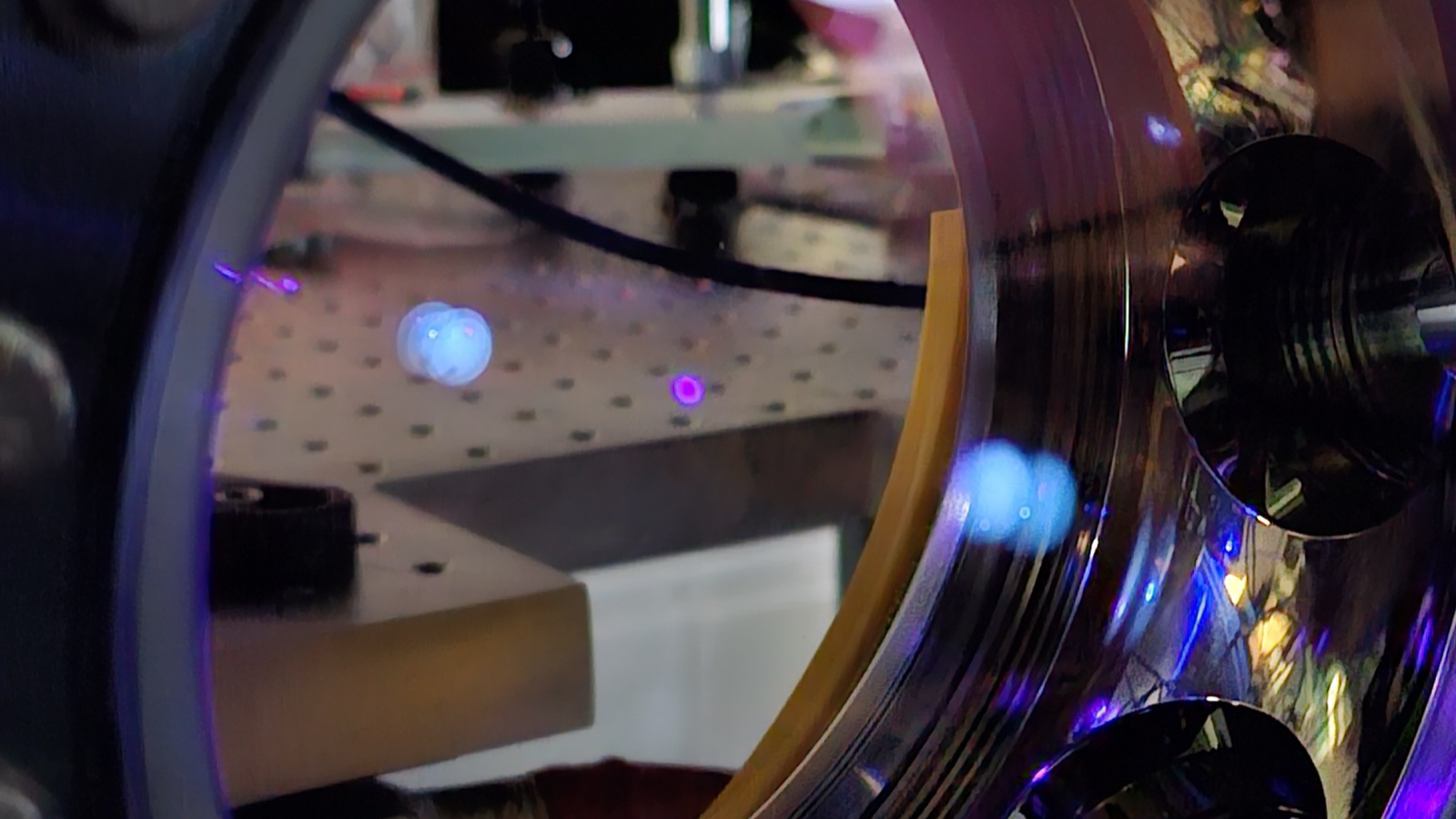 Blue magneto-optical trap fluorescence in the science chamber.